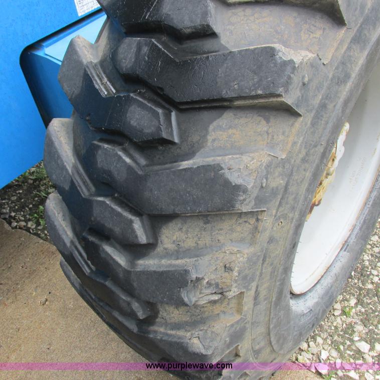 image for item H3300 2000 Genie S-60 boom lift