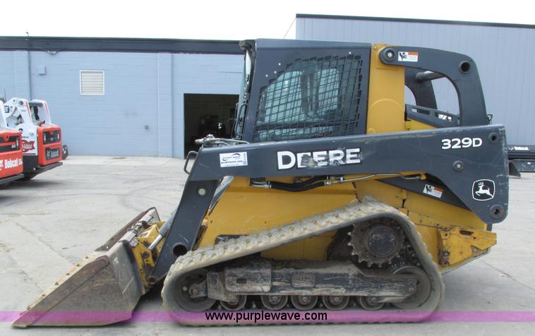 image for item H4599 2011 John Deere 329DT skid steer