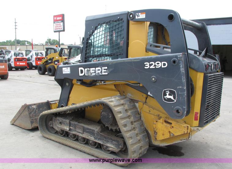 image for item H4599 2011 John Deere 329DT skid steer