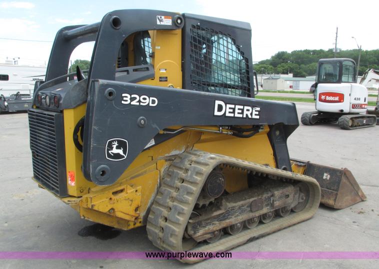 image for item H4599 2011 John Deere 329DT skid steer