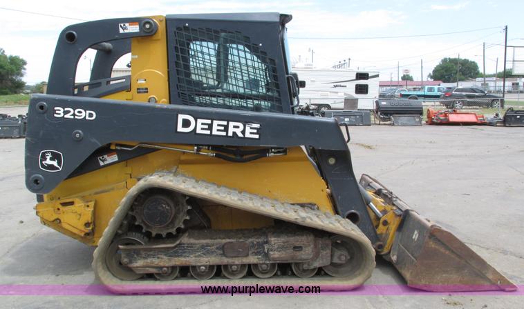image for item H4599 2011 John Deere 329DT skid steer