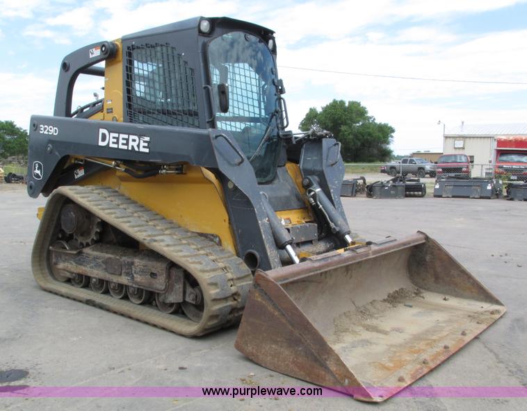 image for item H4599 2011 John Deere 329DT skid steer