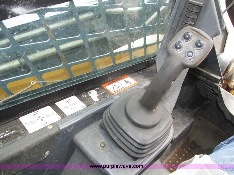 image for item H4599 2011 John Deere 329DT skid steer