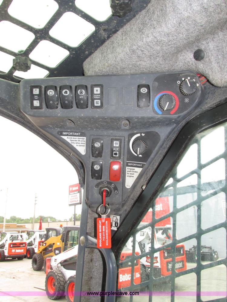 image for item H4599 2011 John Deere 329DT skid steer