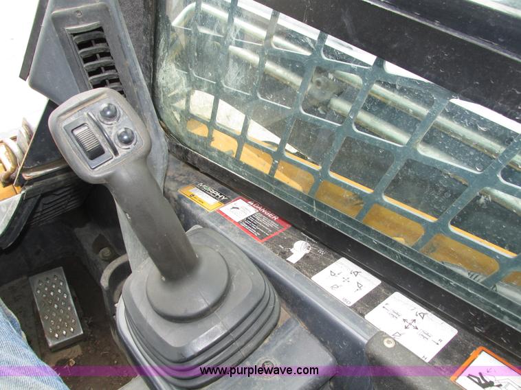 image for item H4599 2011 John Deere 329DT skid steer