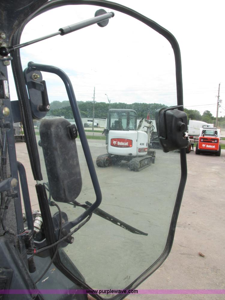 image for item H4599 2011 John Deere 329DT skid steer