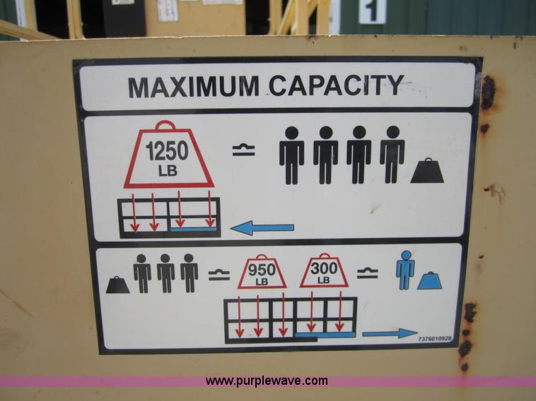 image for item I2119 1998 Grove SM3269XT scissor lift