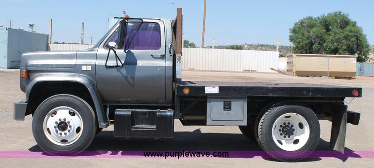 image for item J1494 1985 Chevrolet Kodiak flatbed truck