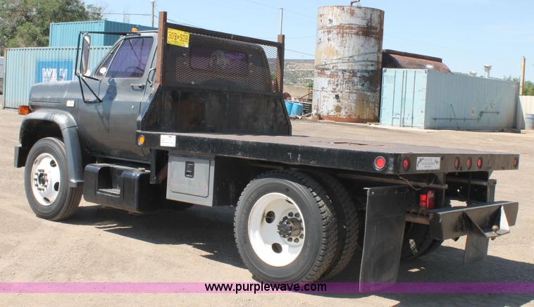 image for item J1494 1985 Chevrolet Kodiak flatbed truck