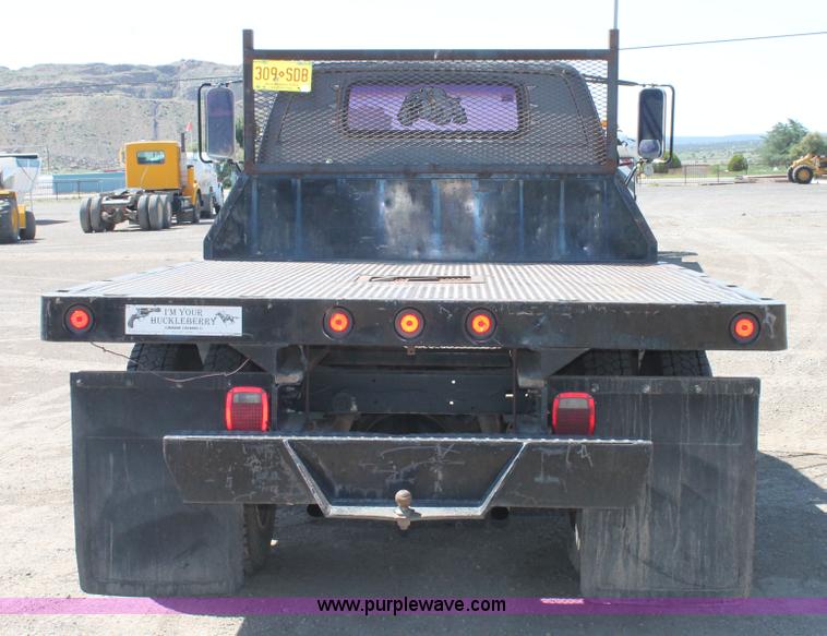 image for item J1494 1985 Chevrolet Kodiak flatbed truck