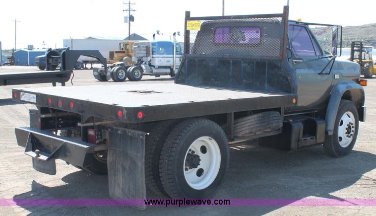 image for item J1494 1985 Chevrolet Kodiak flatbed truck