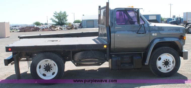 image for item J1494 1985 Chevrolet Kodiak flatbed truck