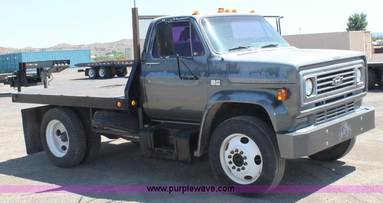 image for item J1494 1985 Chevrolet Kodiak flatbed truck