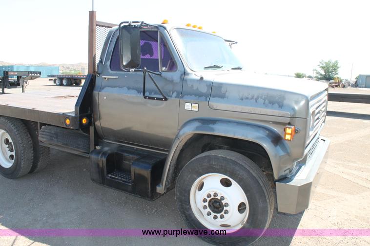 image for item J1494 1985 Chevrolet Kodiak flatbed truck