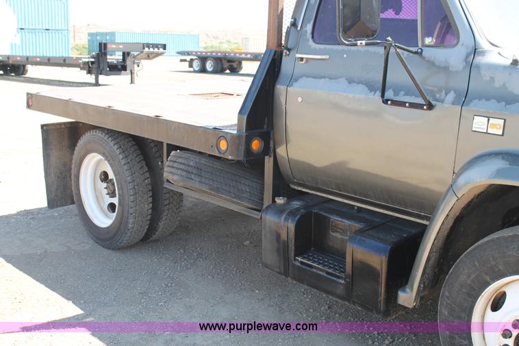 image for item J1494 1985 Chevrolet Kodiak flatbed truck