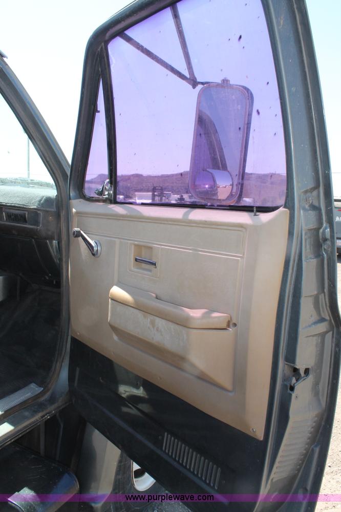 image for item J1494 1985 Chevrolet Kodiak flatbed truck