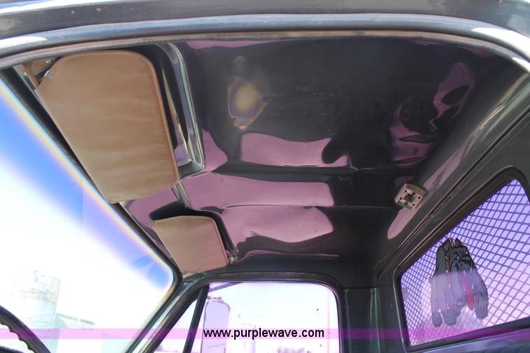 image for item J1494 1985 Chevrolet Kodiak flatbed truck