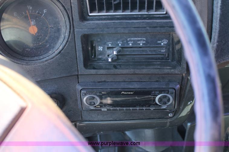 image for item J1494 1985 Chevrolet Kodiak flatbed truck