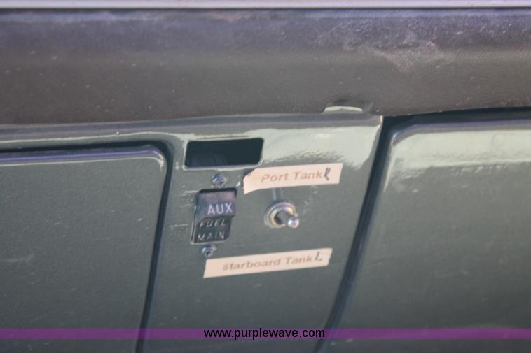 image for item J1494 1985 Chevrolet Kodiak flatbed truck