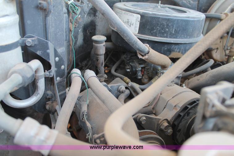 image for item J1494 1985 Chevrolet Kodiak flatbed truck