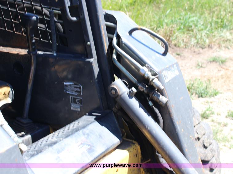image for item K1001 2004 New Holland LS185B skid steer