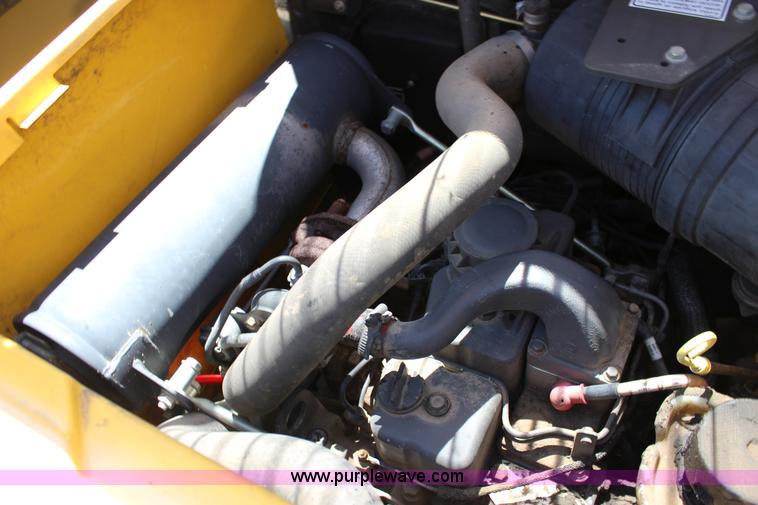 image for item K1001 2004 New Holland LS185B skid steer