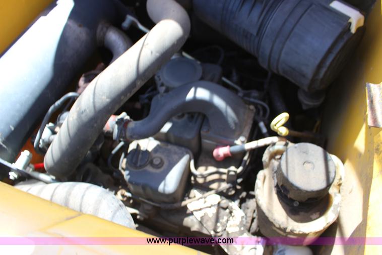 image for item K1001 2004 New Holland LS185B skid steer