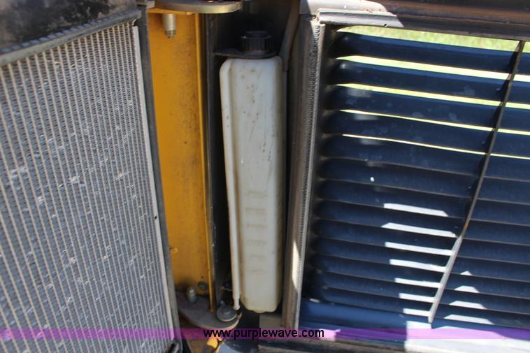 image for item K1001 2004 New Holland LS185B skid steer