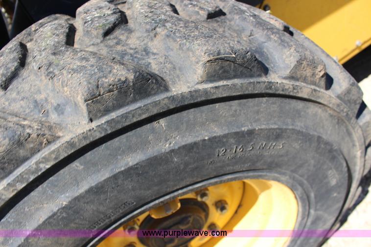 image for item K1001 2004 New Holland LS185B skid steer