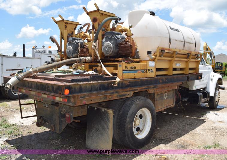 image for item K6049 1999 Ford F800 flatbed truck