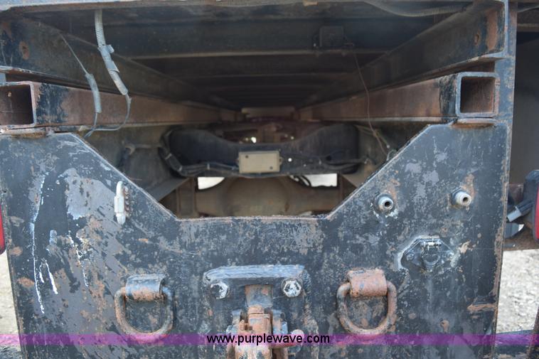 image for item K6053 1999 Ford F700 flatbed truck