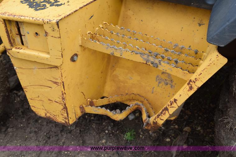 image for item K6068 2002 John Deere 310SG backhoe