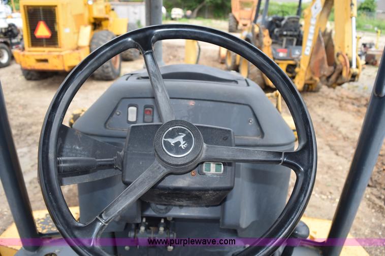 image for item K6068 2002 John Deere 310SG backhoe