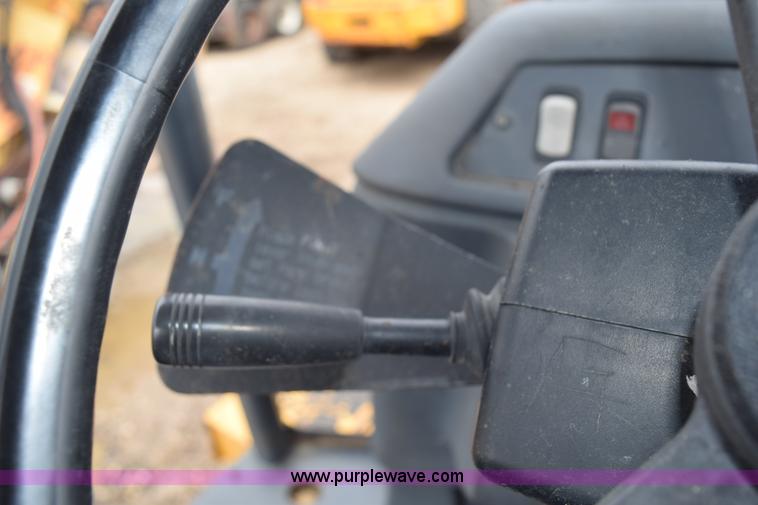 image for item K6068 2002 John Deere 310SG backhoe