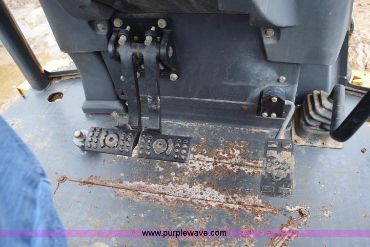 image for item K6068 2002 John Deere 310SG backhoe