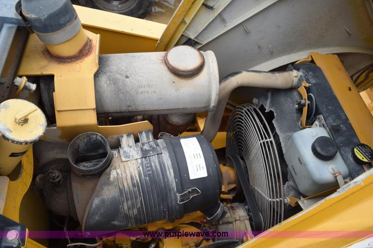 image for item K6068 2002 John Deere 310SG backhoe