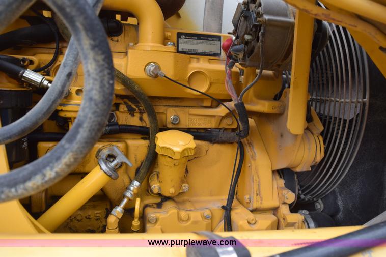 image for item K6068 2002 John Deere 310SG backhoe