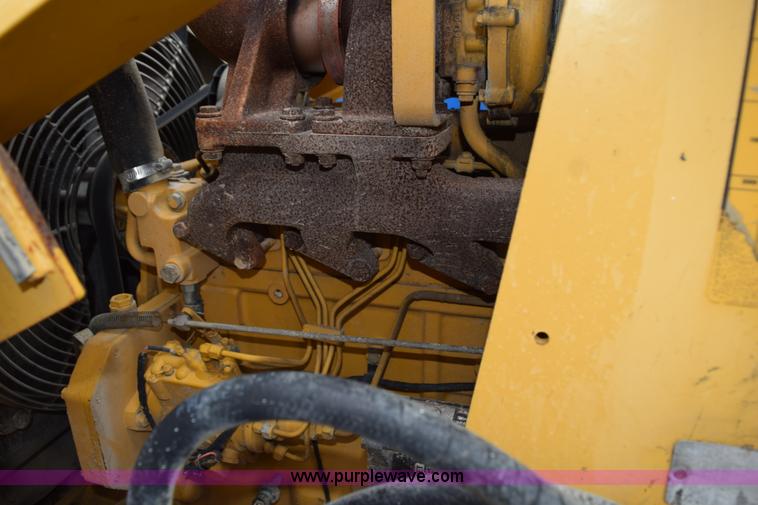 image for item K6068 2002 John Deere 310SG backhoe