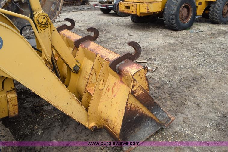 image for item K6068 2002 John Deere 310SG backhoe