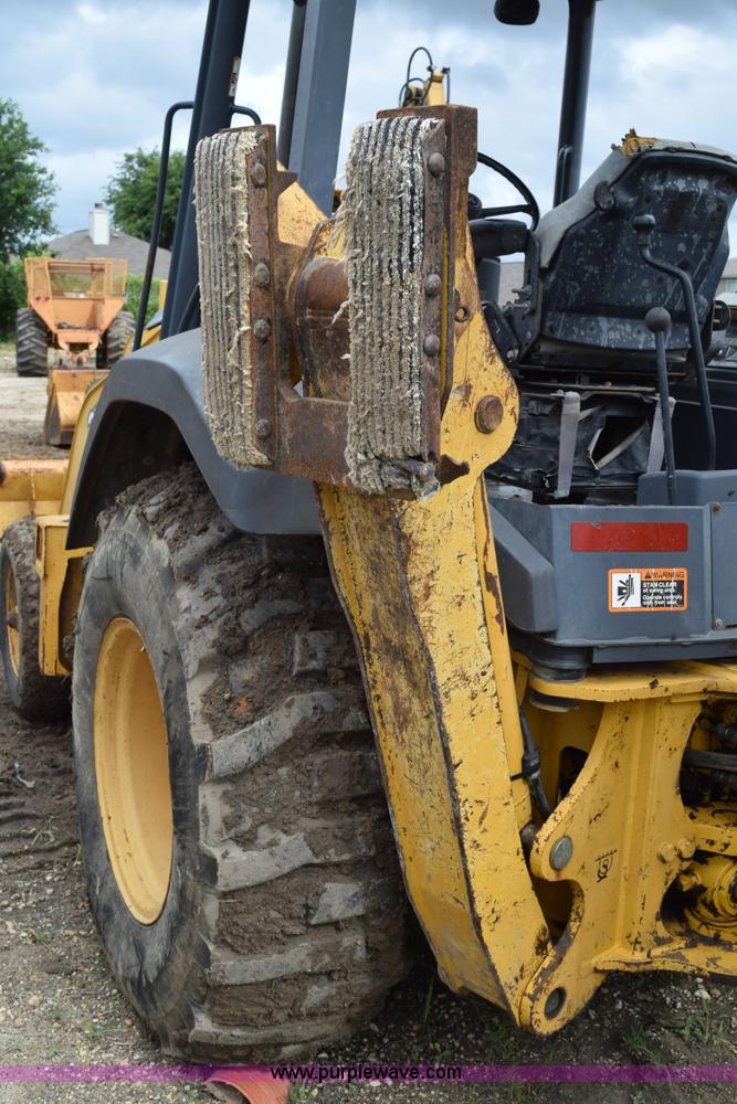 image for item K6068 2002 John Deere 310SG backhoe