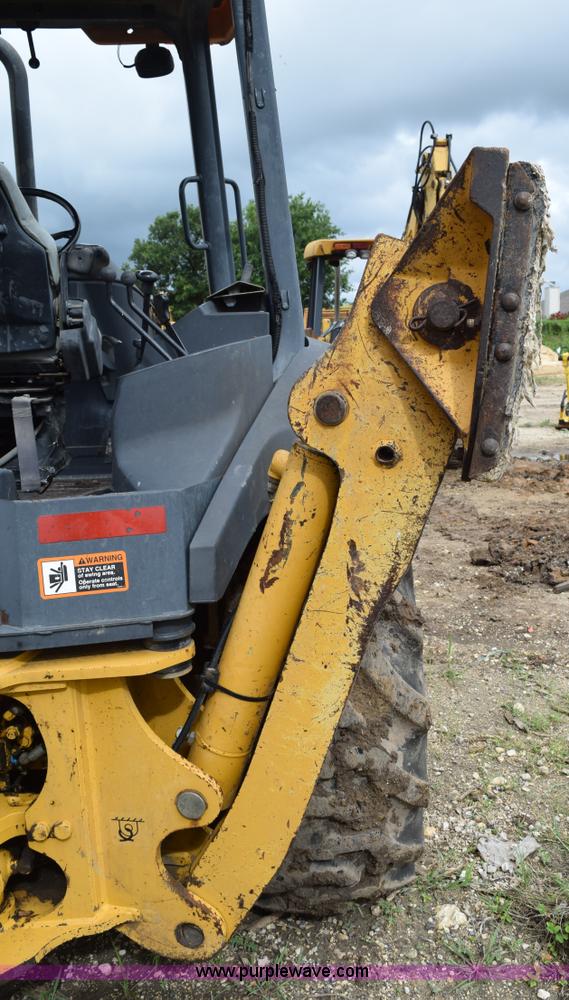 image for item K6068 2002 John Deere 310SG backhoe