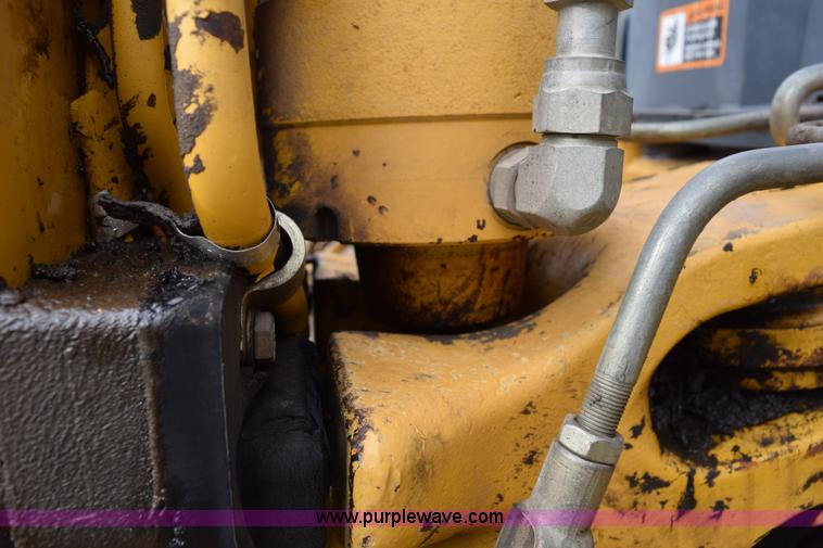 image for item K6068 2002 John Deere 310SG backhoe