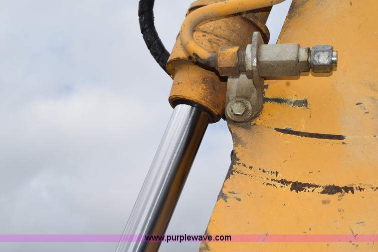 image for item K6068 2002 John Deere 310SG backhoe