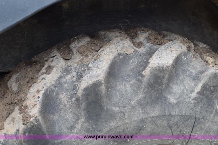 image for item K6068 2002 John Deere 310SG backhoe