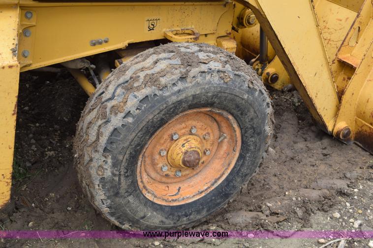 image for item K6068 2002 John Deere 310SG backhoe