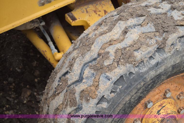 image for item K6068 2002 John Deere 310SG backhoe