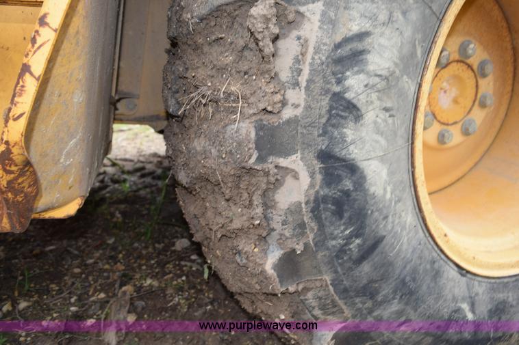 image for item K6068 2002 John Deere 310SG backhoe