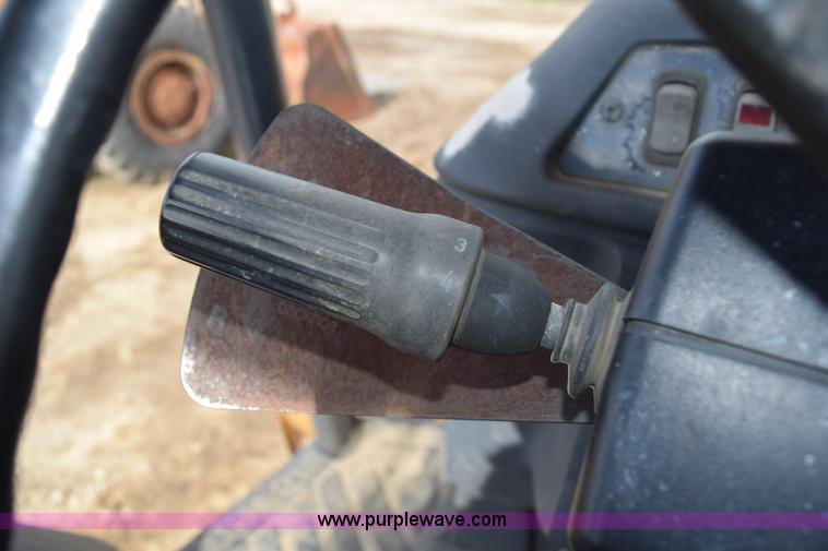 image for item K6069 2005 John Deere 310SG backhoe