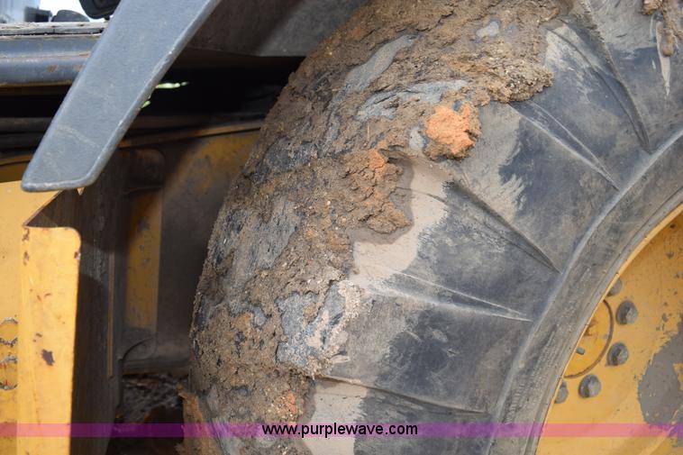 image for item K6069 2005 John Deere 310SG backhoe