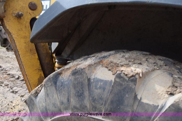 image for item K6069 2005 John Deere 310SG backhoe